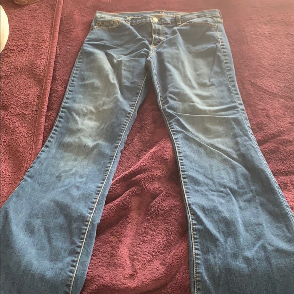 Faded blue denim jeans